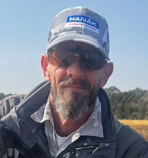 Shayne Prinsloo guiding client with Labeobarbus aeneus (Smallmouth Yellowfish) in Parys